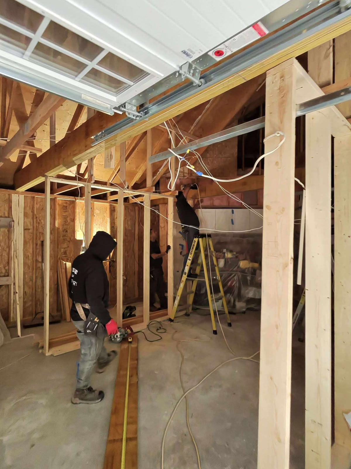 New stud walls, wiring and roof modifications in progress